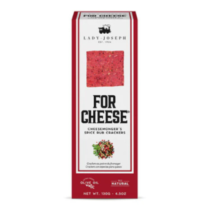 Cracker vegana especial para acompañar quesos y con sabores originales de una marca española y que de colorido en un tabla de quesos